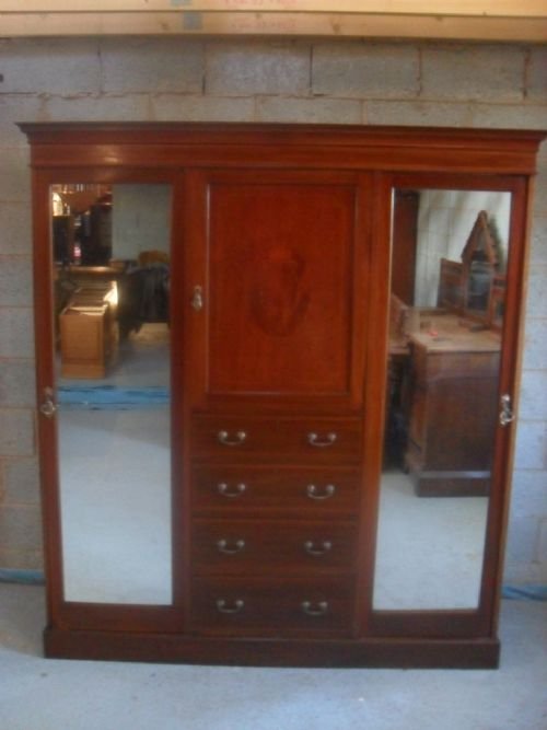 	
Edwardian Inlaid Mahogany 3 Door Compactum Wardrobe