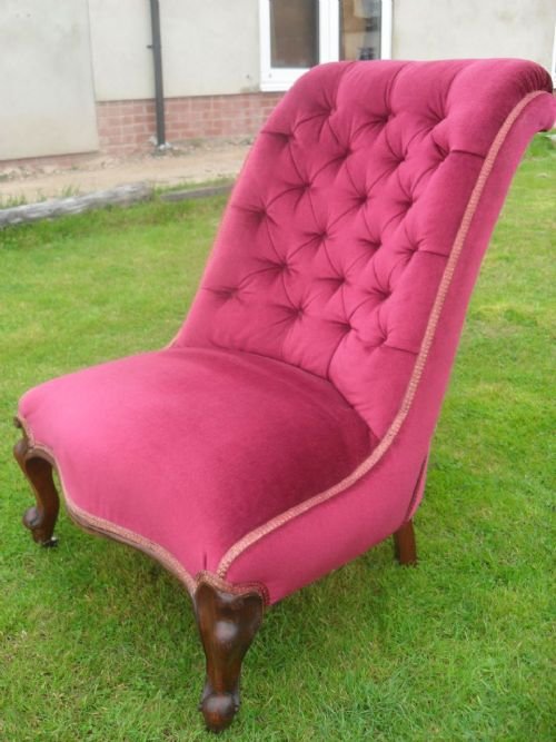 	
Victorian Walnut Framed and Upholstered Fireside Chair