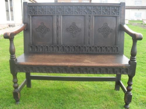 18th Century Carved Oak Triple Panelled Settle