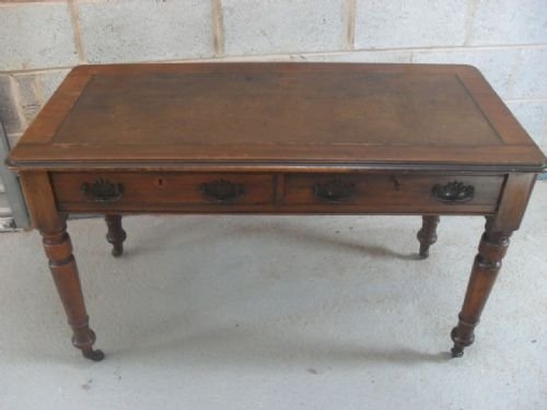 Victorian Mahogany and Leather Top Writing Table