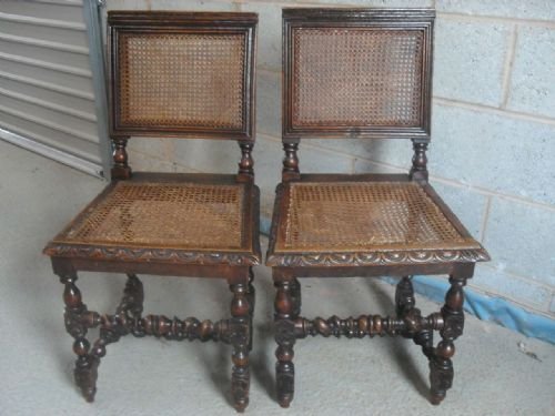 	
Pair of Victorian Carved Oak Bergere Caned Hall Chairs