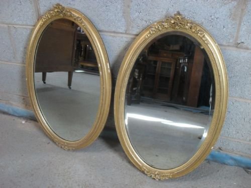 Pair of 19th Century Gilt Floral and Beaded Edged Framed Oval Mirrors