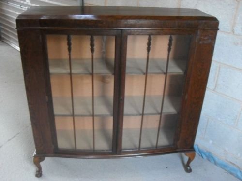 Oak Slight Bow Front Display Cabinet on Ball and Claw Feet