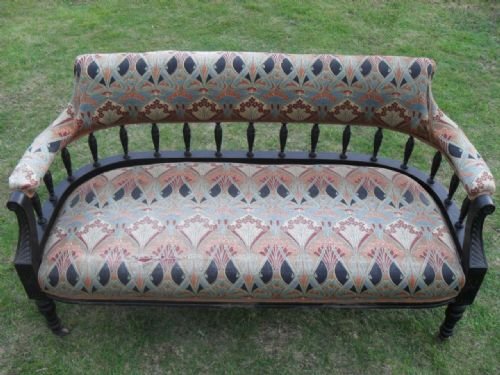 Victorian Ebonised Mahogany Framed Upholstered Two-seater Settee