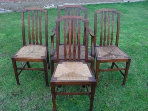 Set of 4 Oak Slat Back and Woven Seat Dining Chairs