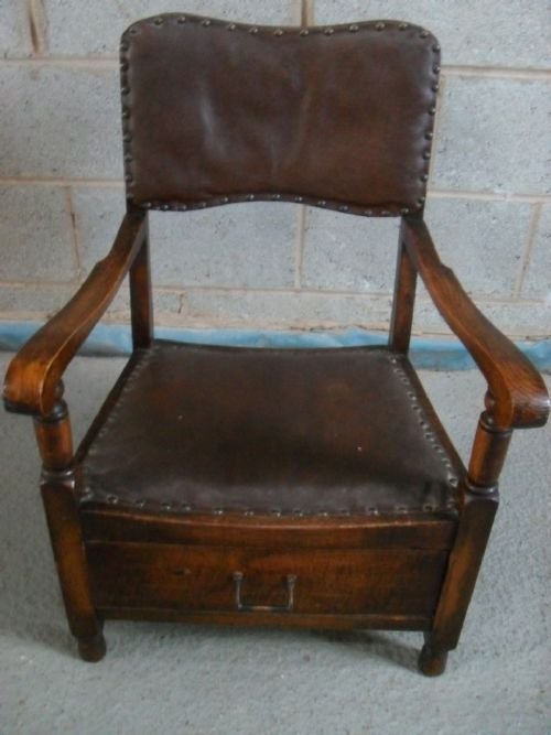 Low Oak Leather Studded Open Armchair with Drawer Under