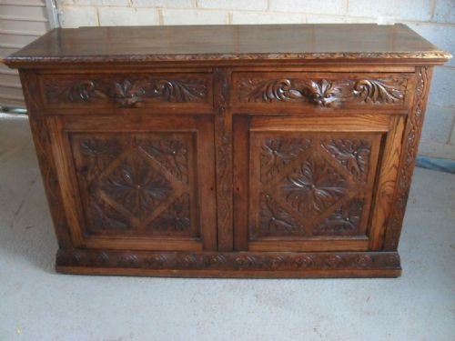 Lovely Victorian Carved Oak Side Board/cupboard with 2 Green Man Drawers