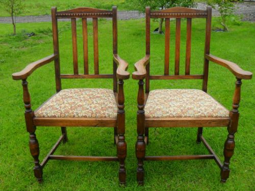 Pair of Oak Slat Back Carver Open Armchairs
