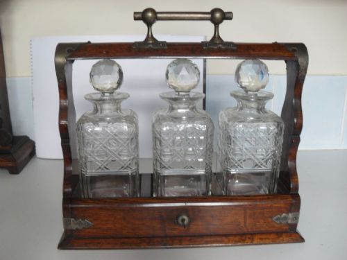 Victorian Oak and Plated 3 Cut Glass Bottle Tantalus with Fold Down Front and Key