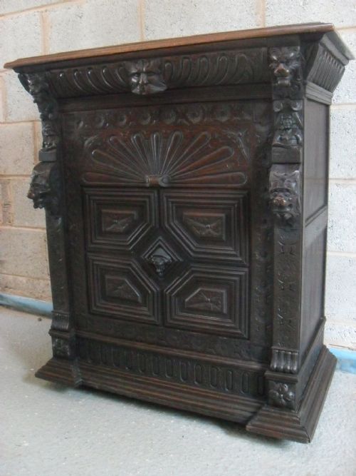 Superb Victorian Carved Oak Side Cupboard with Green Man Drawer