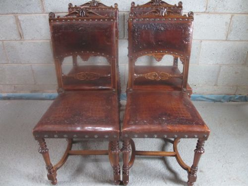 Set of 4 Flemish 19th Century Carved Walnut & Studded Leather Dining Chairs