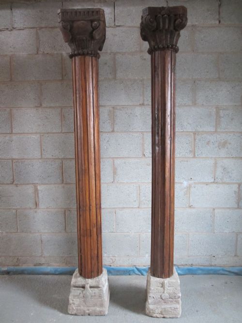 Pair of 19th Century Heavy Carved Colonial Mango Columns with Stone Bases