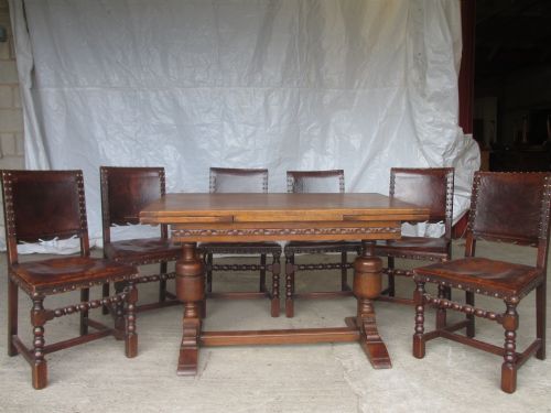 Set of 6 Oak and Leather Dining Chairs and Oak Draw Leaf Dining Table