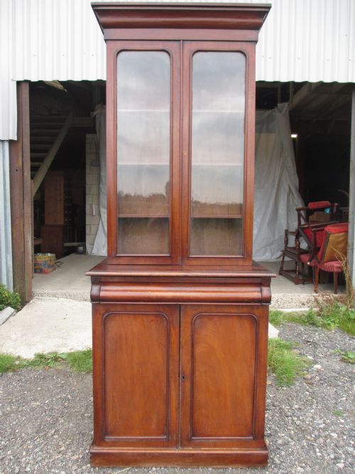 Victorian Mahogany Glazed Two Piece Display Bookcase Cupboard, Top with Two Glazed Doors, Adjustable Shelves, Bottom with Single Cushion Fronted Drawer, Two Cupboard Drawers and Shelf Interior