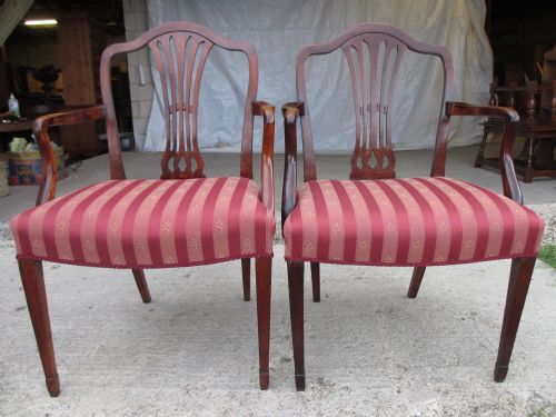 Pair of Georgian Mahogany Armchairs with Shaped Crest Rail and Pierced Splat, Overstuffed Upholstered  Seats on Tapering Forelegs
