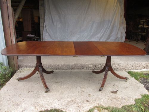 19th Century Mahogany Extending Twin Tripod D-end Dining Table with Brass Paw Castors with 2 Leaves