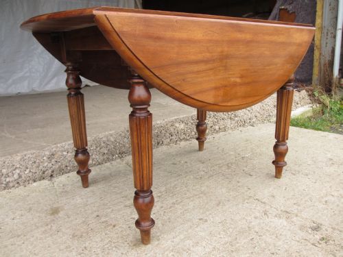 Victorian Mahogany Circular Top Drop Leaf Dining Table Turned Reeded Supports