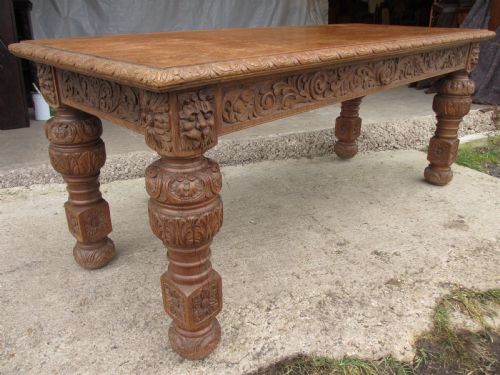 Victorian Carved Heavy Oak Dining Table with Lion Heads and Floral and Leaf Frieze on Solid Oak Supports