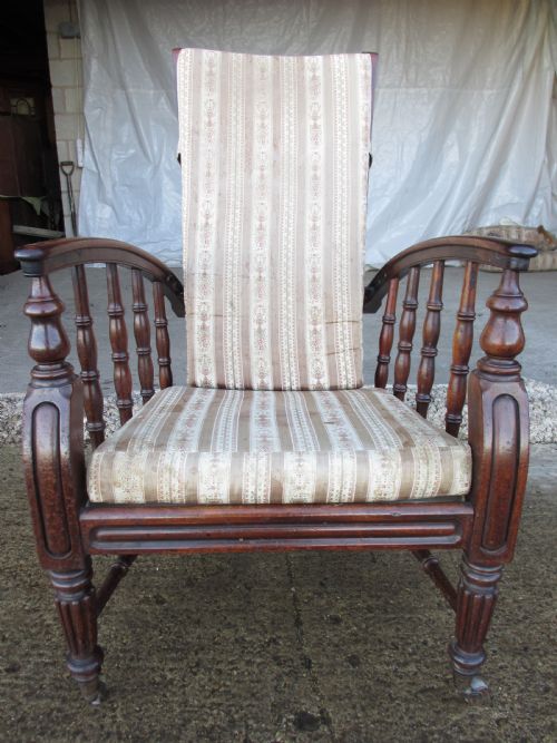 19TH CENTURY MAHOGANY ADJUSTABLE STEAMER ARMCHAIR LADDERBACK ON CASTORS - ADDITIONAL PHOTO 1