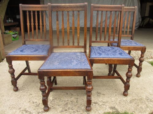 Four Late 19th Century Oak Slat Back Dining Chairs