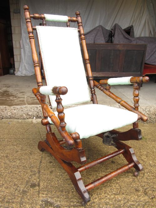 19TH CENTURY BEECHWOOD AND UPHOLSTERED AMERICAN ROCKING CHAIR - ADDITIONAL PHOTO 1