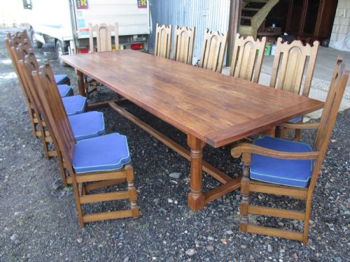 A Lovely 20th Century Oak Refectory Dining Table and Set of 12 Chairs