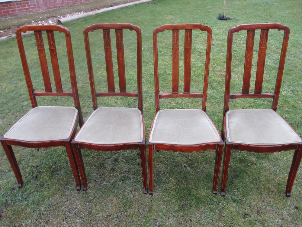 Set of 4 Edwardian Mahogany and inlaid slat back dining chairs 