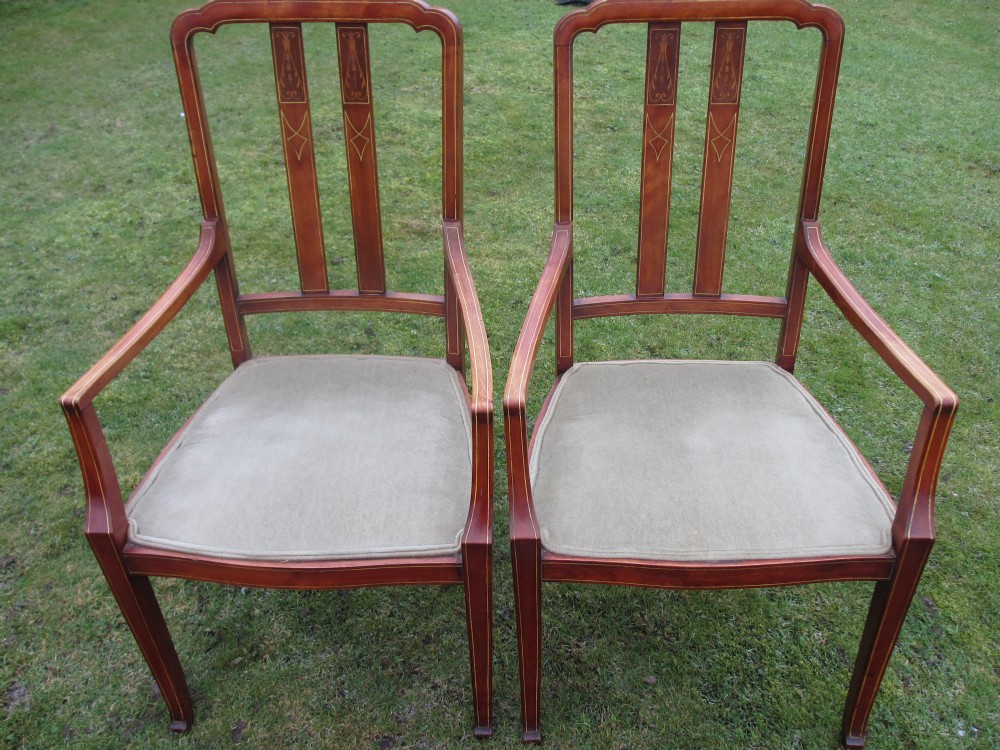 Pair of Edwardian Mahogany and inlaid slat back carver armchairs 
