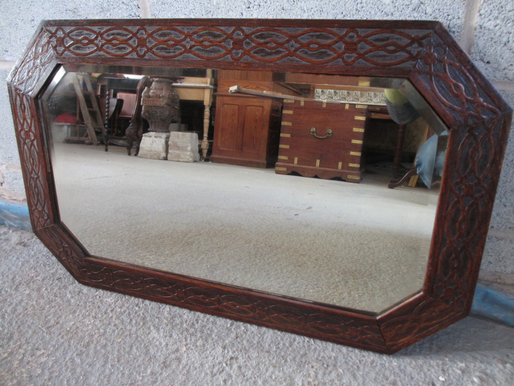 Carved Oak framed bevel edged rectangular wall hanging mirror