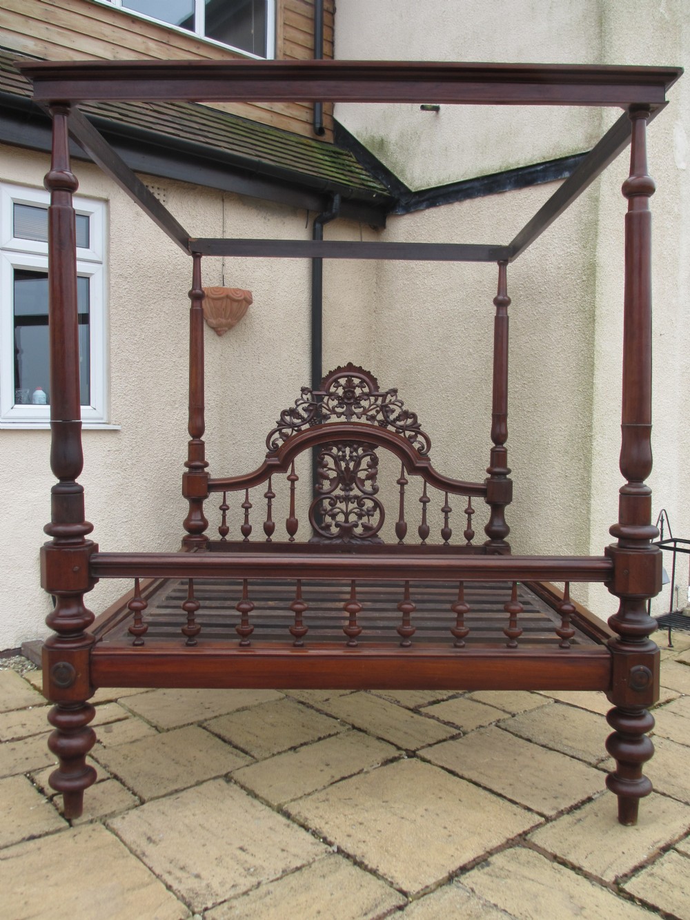 Superb 19th Century carved and fretwork Mahogany four poster king size bed