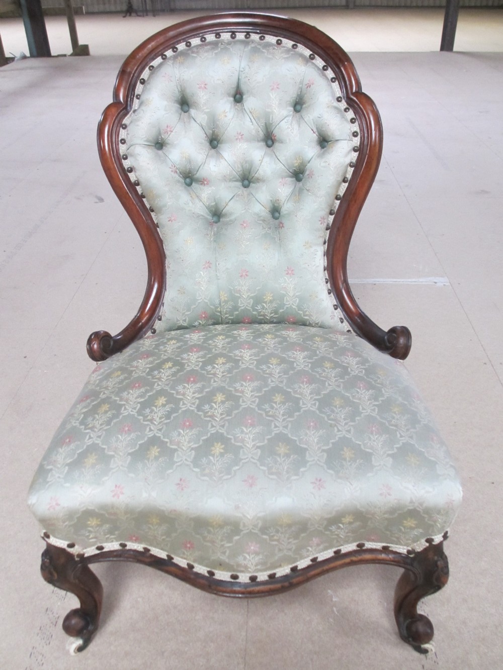 Victorian Walnut carved spoon back button upholstered nursing chair