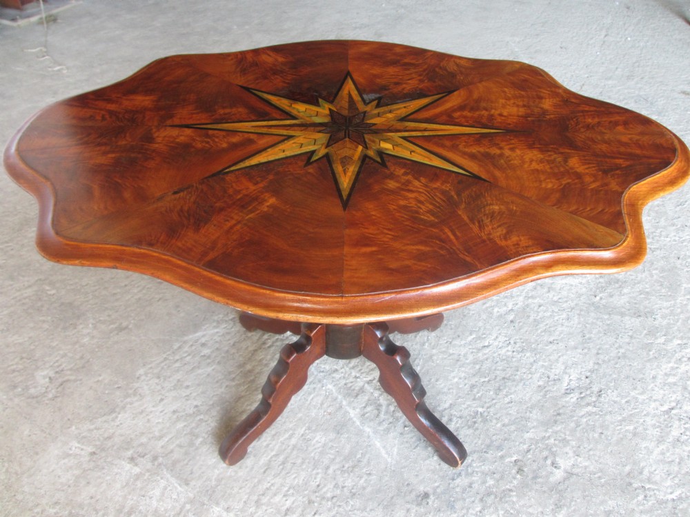 Victorian Walnut and star inlaid shaped occasional table 