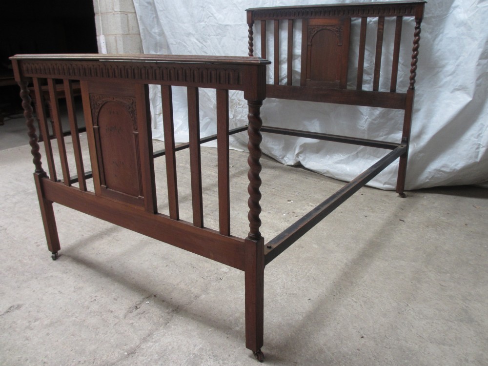 Edwardian solid oak barley twist slat and carved panel double bed 