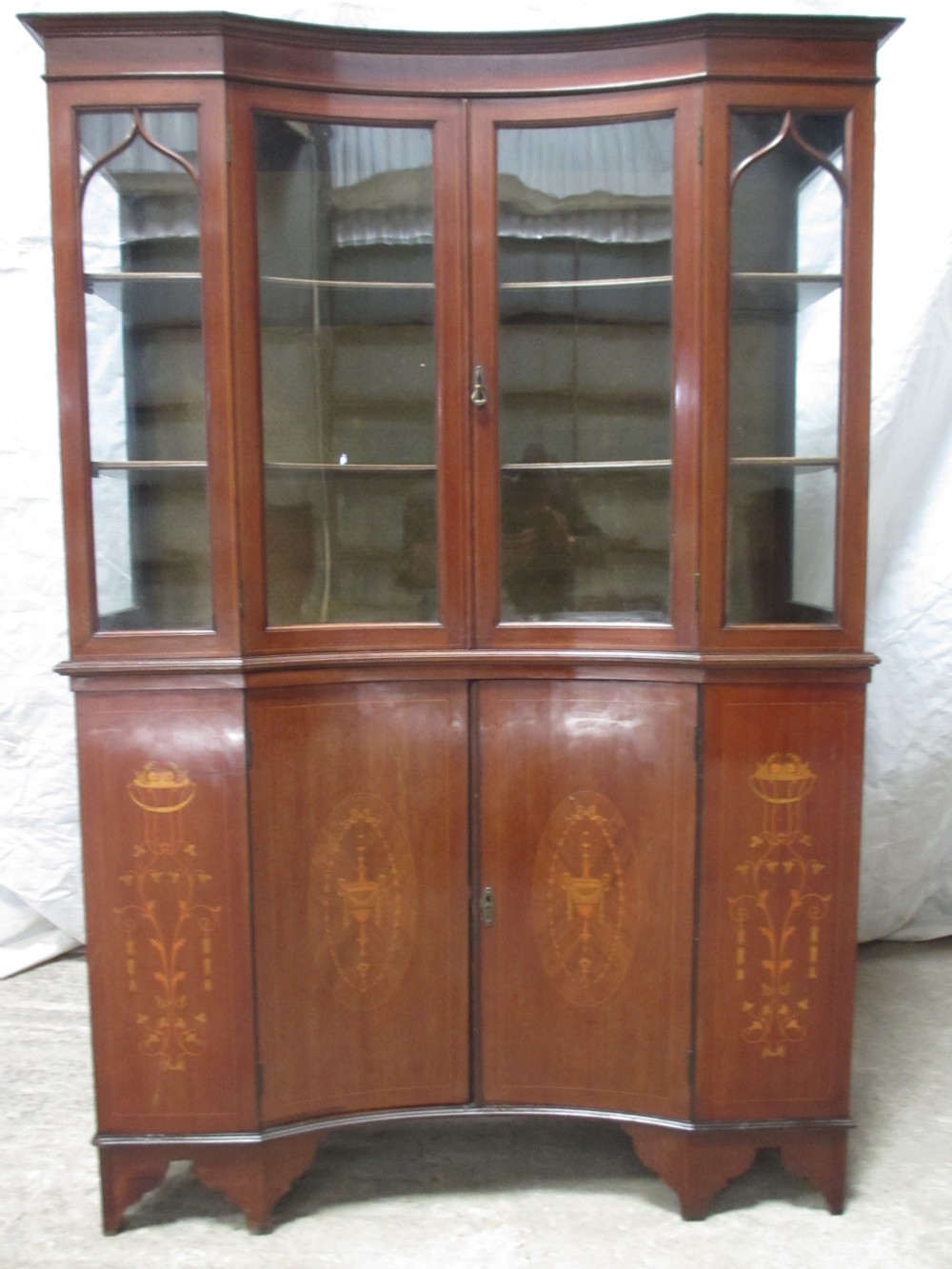 Superb Edwardian inlaid mahogany inverted breakfront two part display cabinet