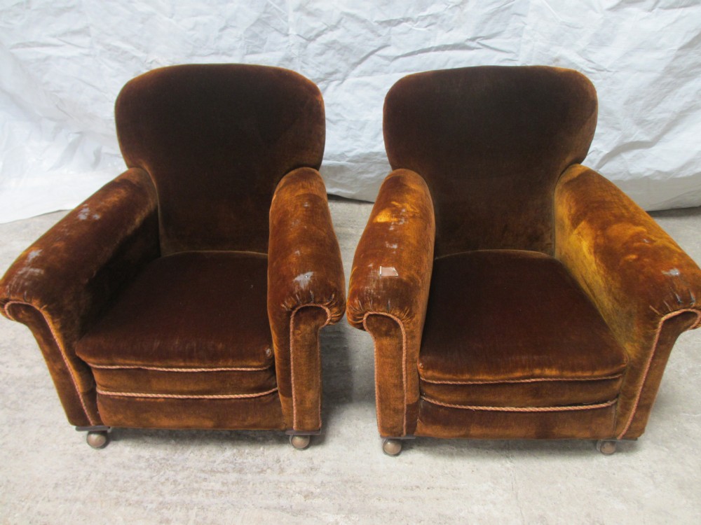 Pair of Edwardian upholstered club armchairs