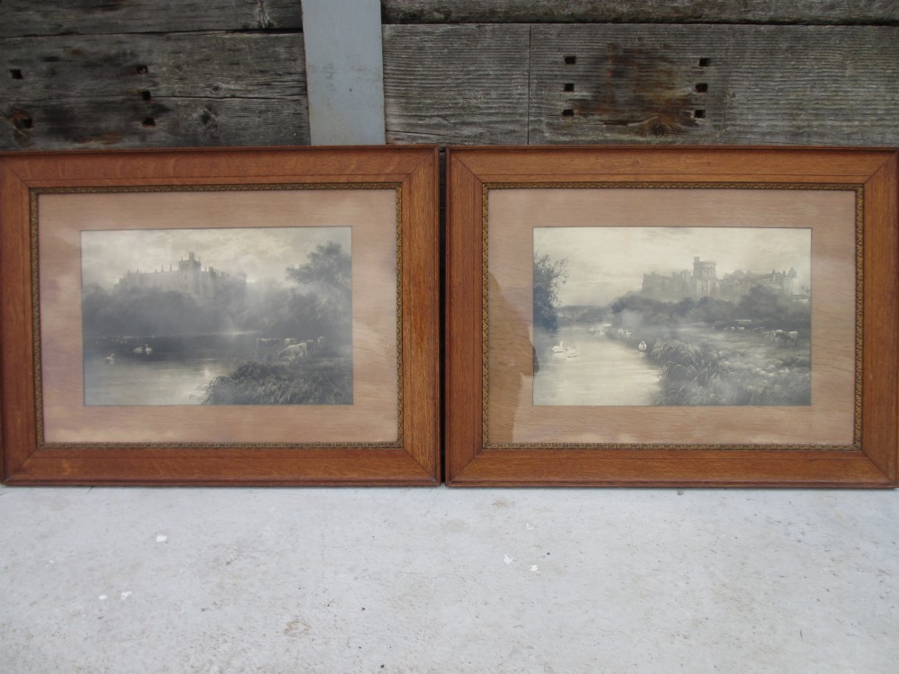 Pair of lovely golden Oak & gilt picture frames with prints of castles