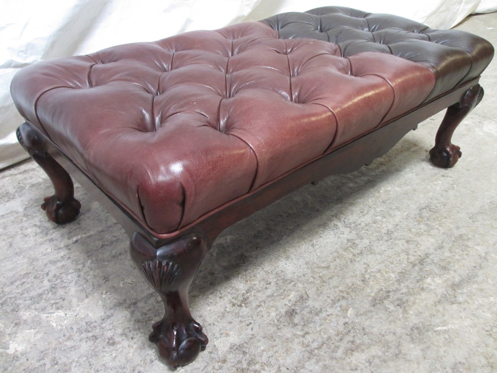 Good sized Edwardian Mahogany and button leather upholstered footstool