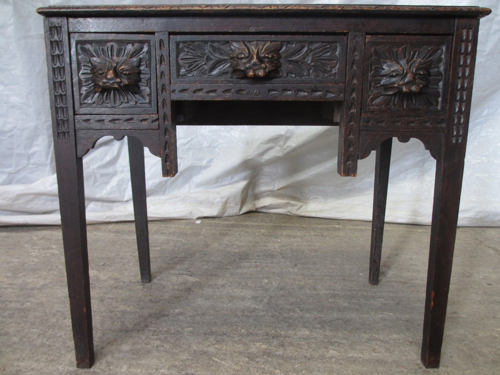 Victorian carved Oak green man low boy side table 