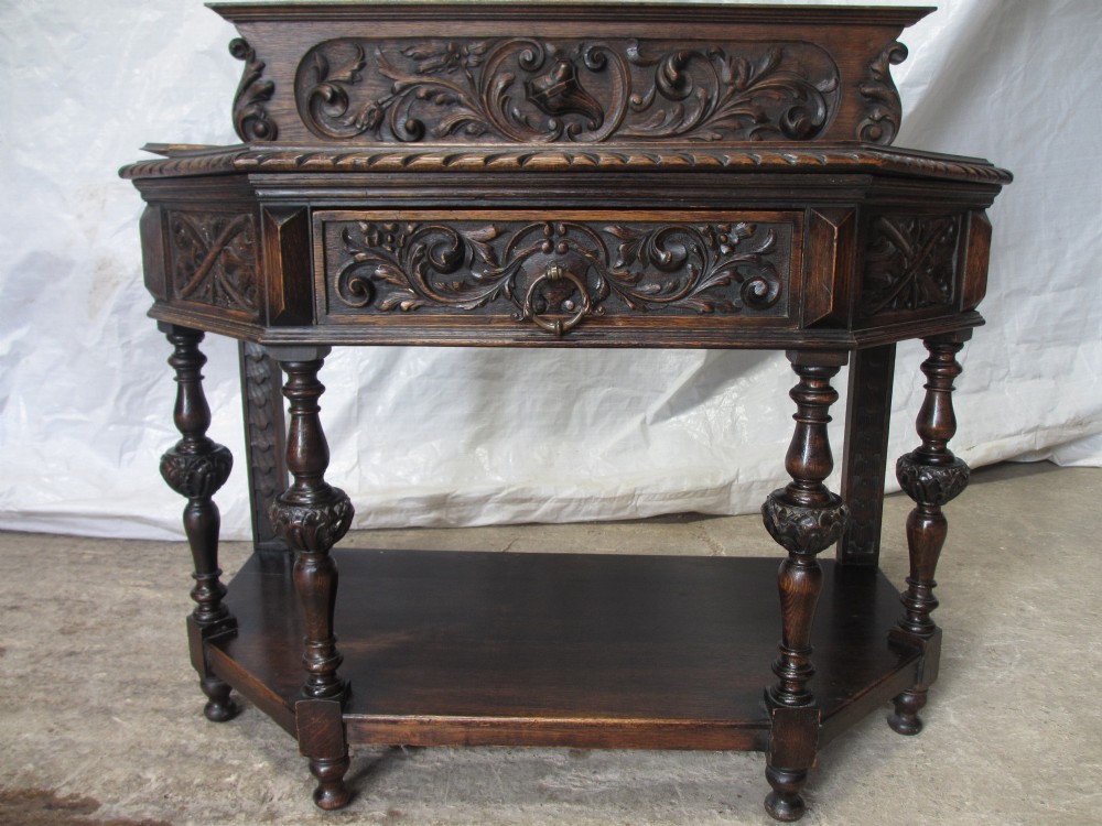 Victorian quality carved Oak console side table with canted corners
