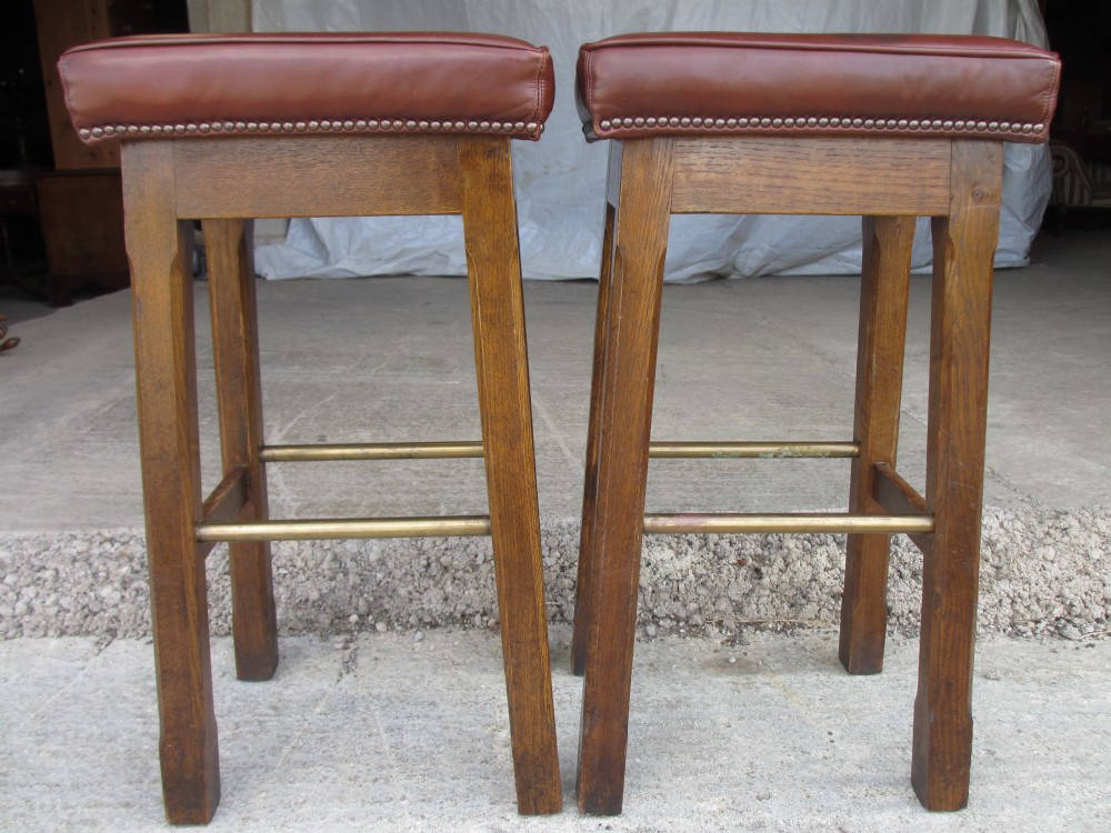 Quality pair of Oak and leather seat bar stools
