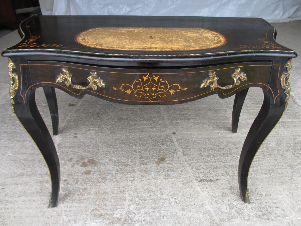 Superb French ebonised inlaid mahogany writing table desk gilt ormolu mounts to large drawer and cabriole legs with tooled leather insert to top