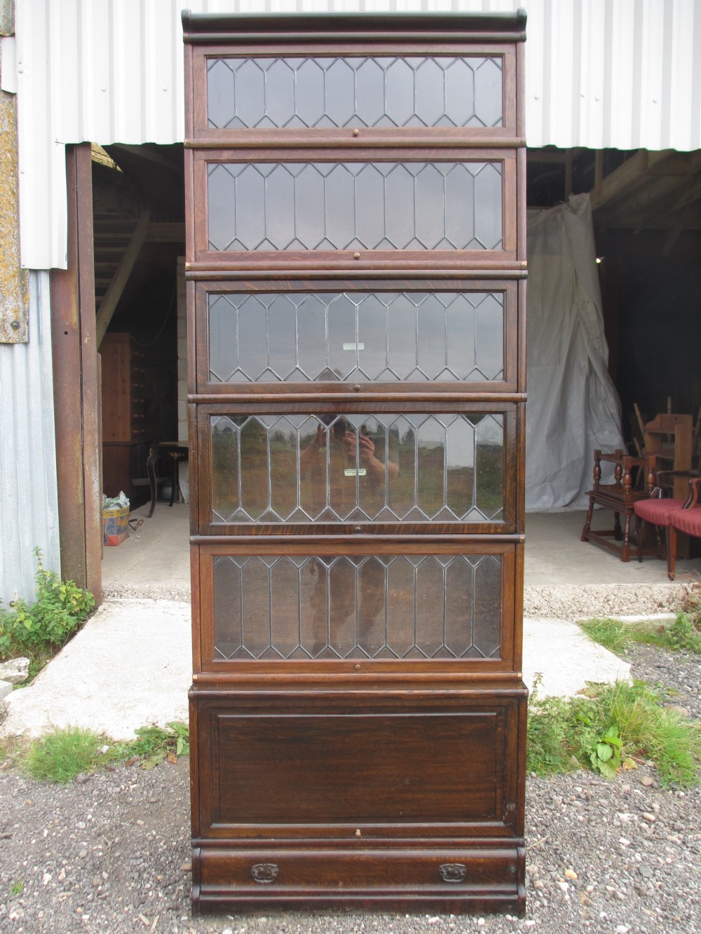 Superb Six Section Stacking Oak Leaded Glazed Globe Wernicke Bookcase with Large Cupboard and Drawer to Bottom