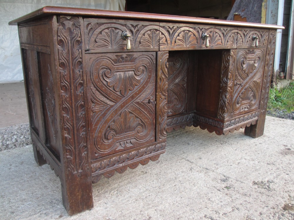 Victorian Heavily Carved Oak Kneehole Desk, 2 Cupboards 3 Drawers  View II