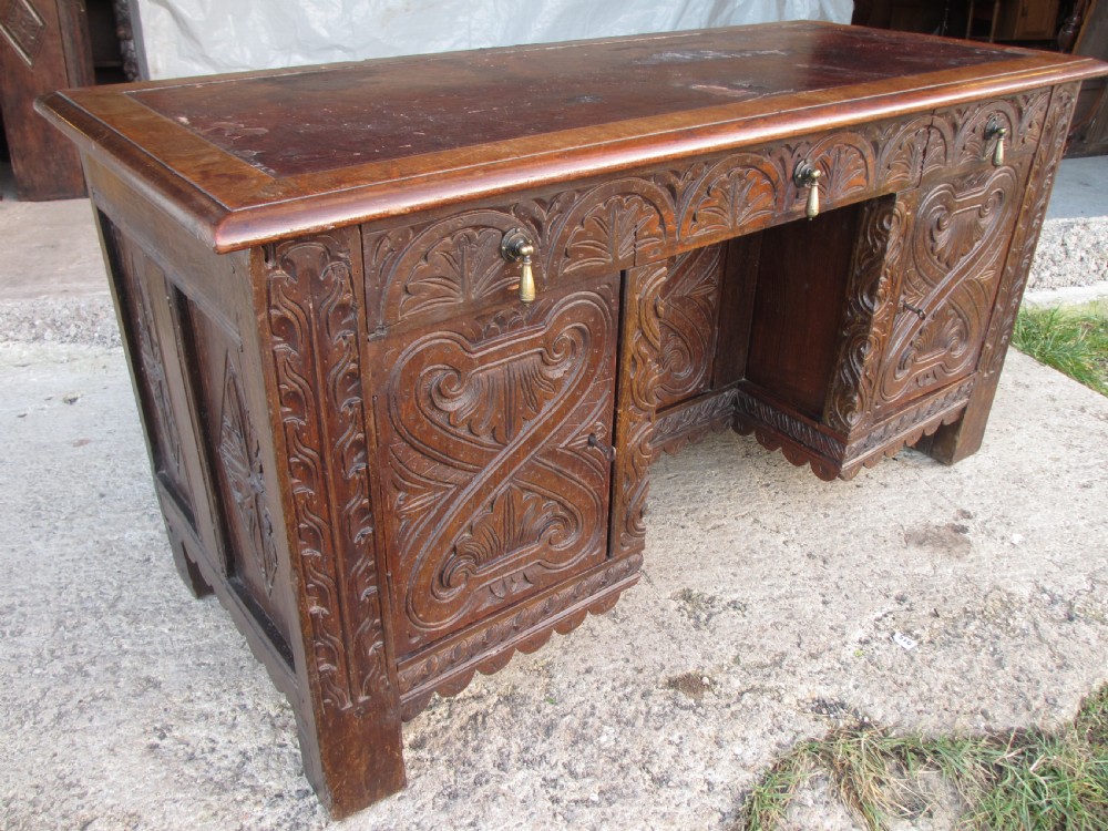 Victorian Heavily Carved Oak Kneehole Desk, 2 Cupboards 3 Drawers  View IV