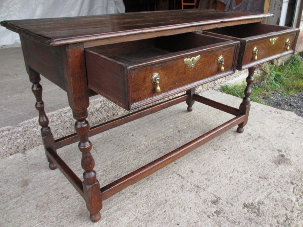 Georgian oak console side table with box stretcher and twin drawers View X
