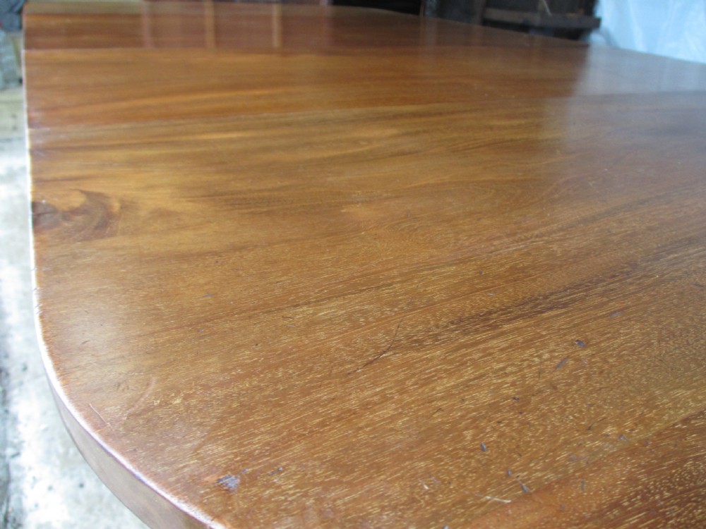 Edwardian D-end mahogany extending dining table, 2 leaves and winding handle, tapered legs and spade feet View II
