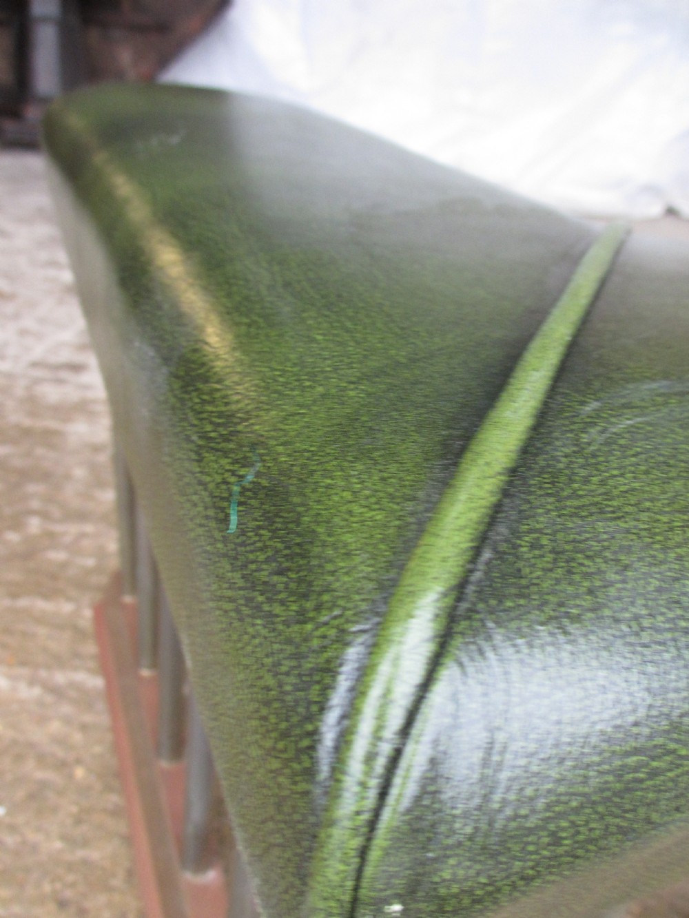 Edwardian brass and upholstered club fire fender with cylindrical uprights  View IV