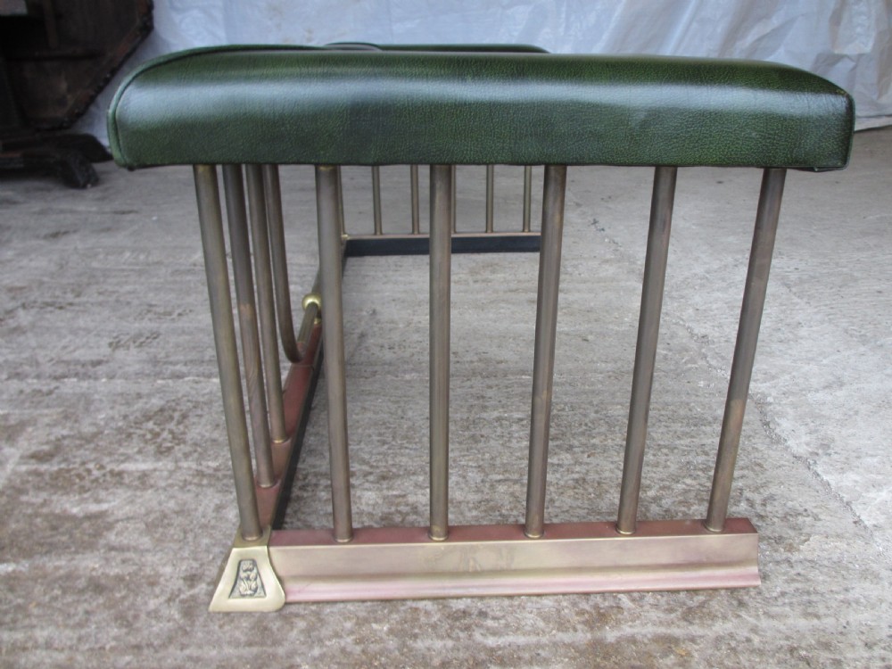 Edwardian brass and upholstered club fire fender with cylindrical uprights  View IX