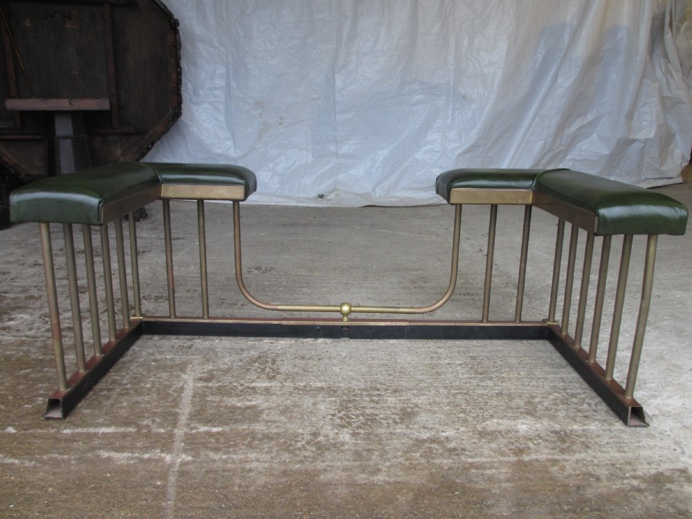 Edwardian brass and upholstered club fire fender with cylindrical uprights  View X