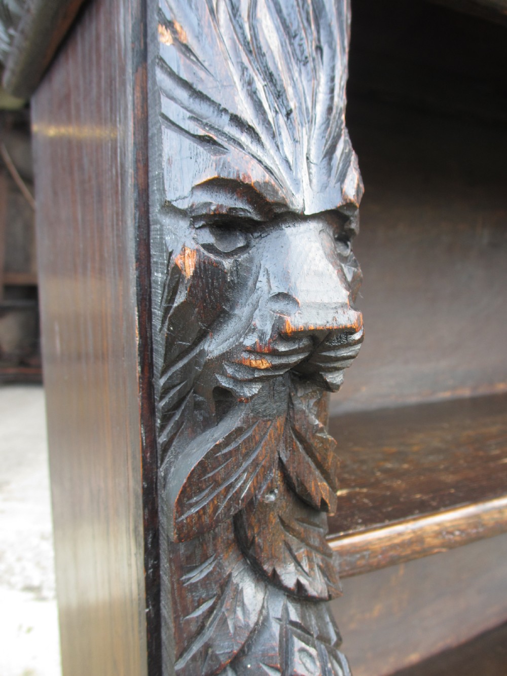 Victorian Oak carved open bookcase with adjustable shelves, lion heads and floral carved columns  View VII